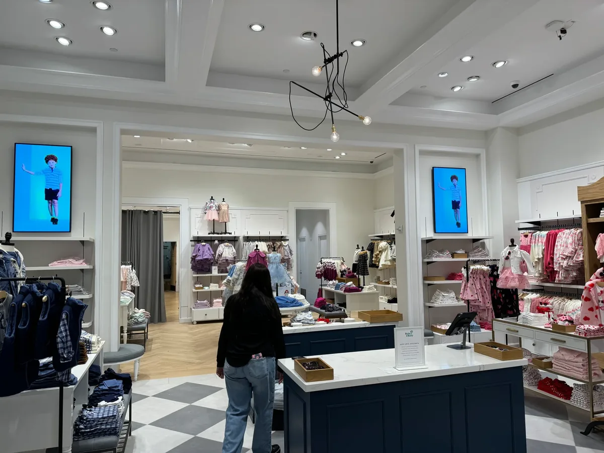 Enterprise digital signage at a Janie and Jack store, one of 115+ locations on the same kit