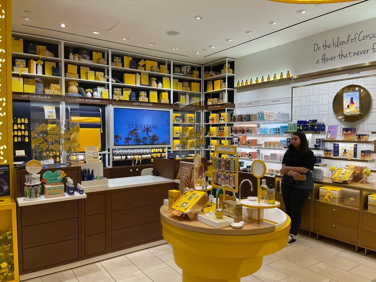 Managed digital signage at an L'Occitane boutique, one of 150+ monitored stores